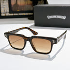 Tortoiseshell-frame sunglasses with tan lenses and silver-tone details
