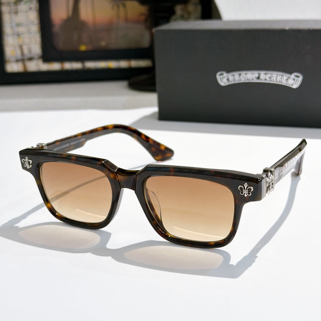 Tortoiseshell-frame sunglasses with tan lenses and silver-tone details