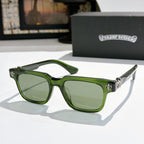 Green-frame sunglasses with tinted green lenses and gold-tone logo accents