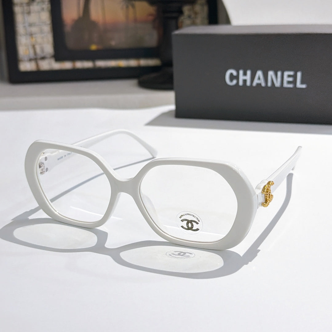 Chanel eyeglasses, white rounded-square frames with gold-tone temple logo and clear lenses