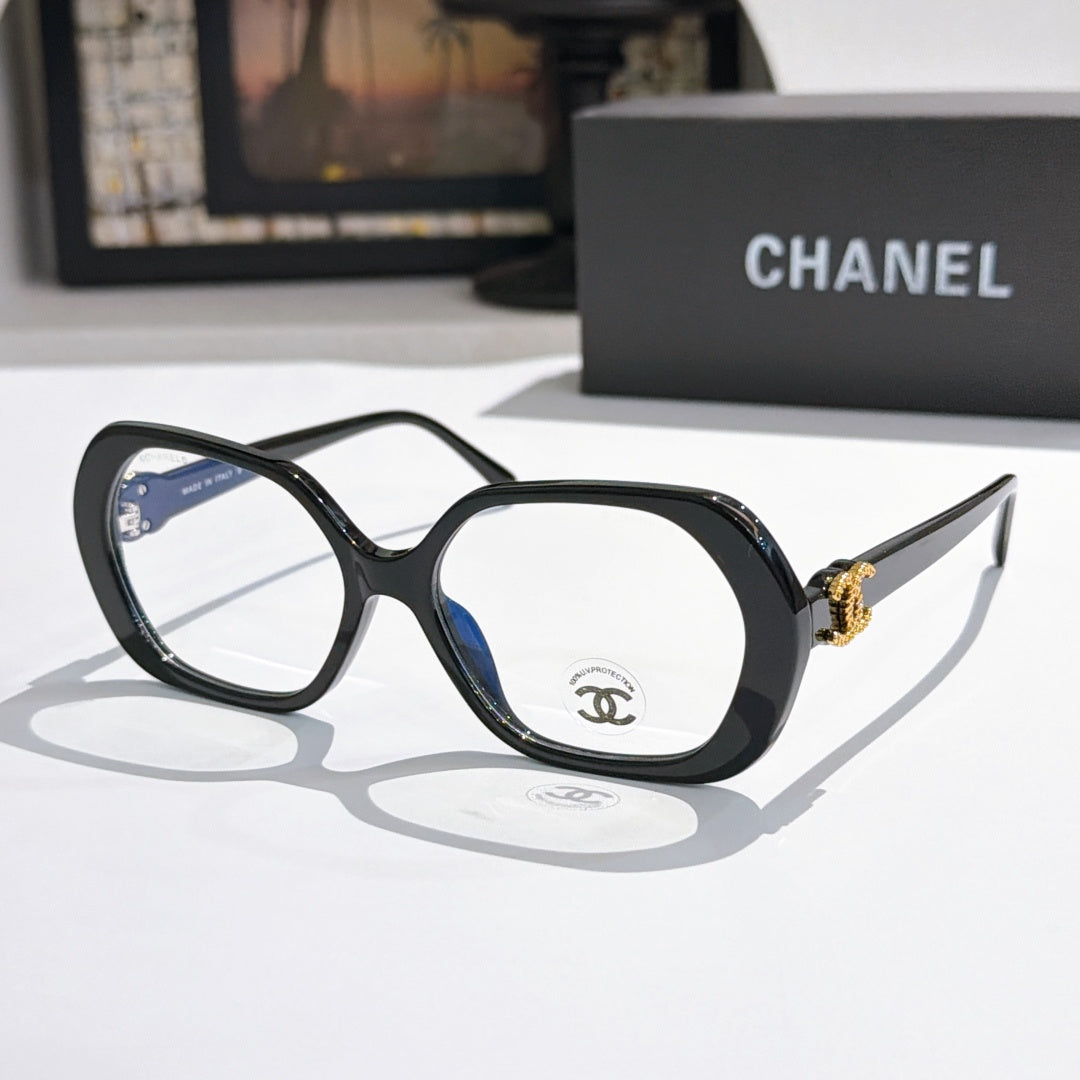 Chanel eyeglasses, black square frames with gold-tone temple logo and clear lenses