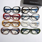 Chanel eyeglasses assortment, multiple colored frames with gold-tone temple logos and clear lenses