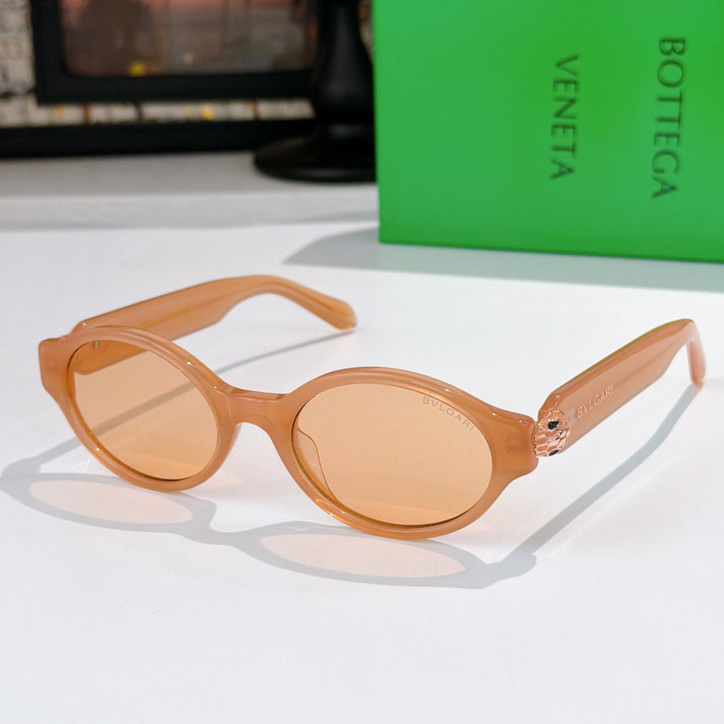 Bottega Veneta sunglasses, orange frames with amber-tinted lenses