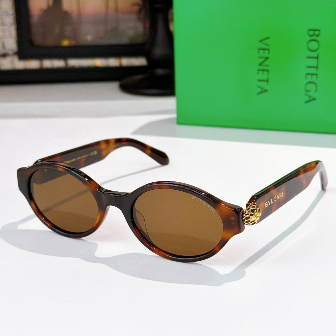 Bottega Veneta sunglasses, tortoiseshell frames with brown-tinted lenses