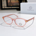 Round eyeglasses with pink-tinted frames and clear lenses