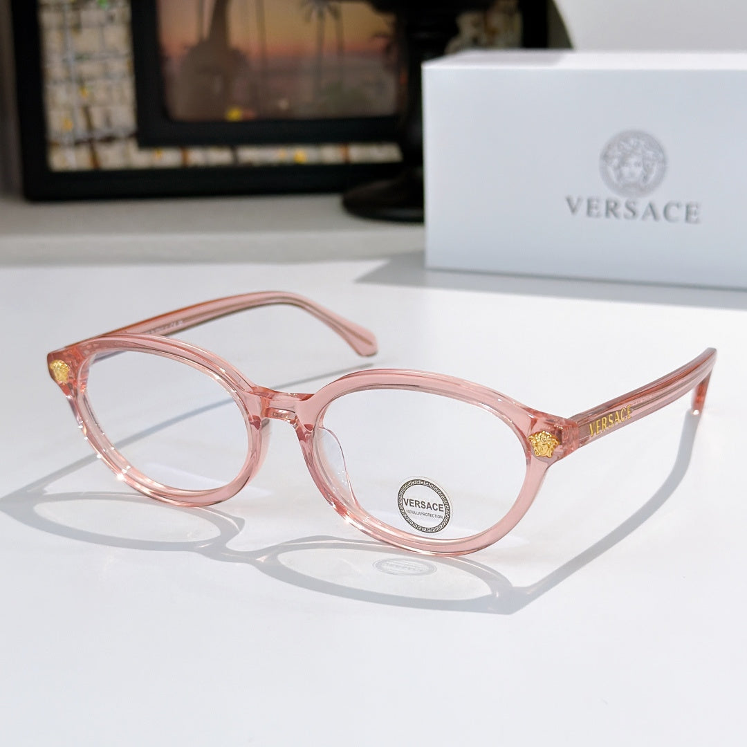 Round eyeglasses with pink-tinted frames and clear lenses