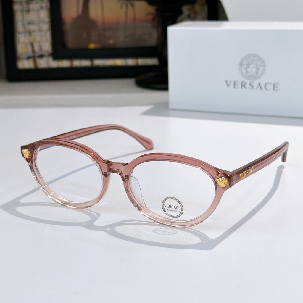 Round eyeglasses with light pink frames and clear lenses