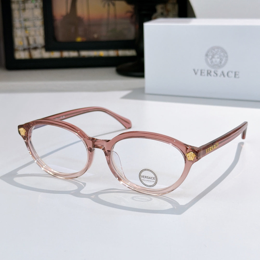 Round eyeglasses with light pink frames and clear lenses