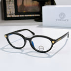 Round eyeglasses with black frames and blue tinted lenses