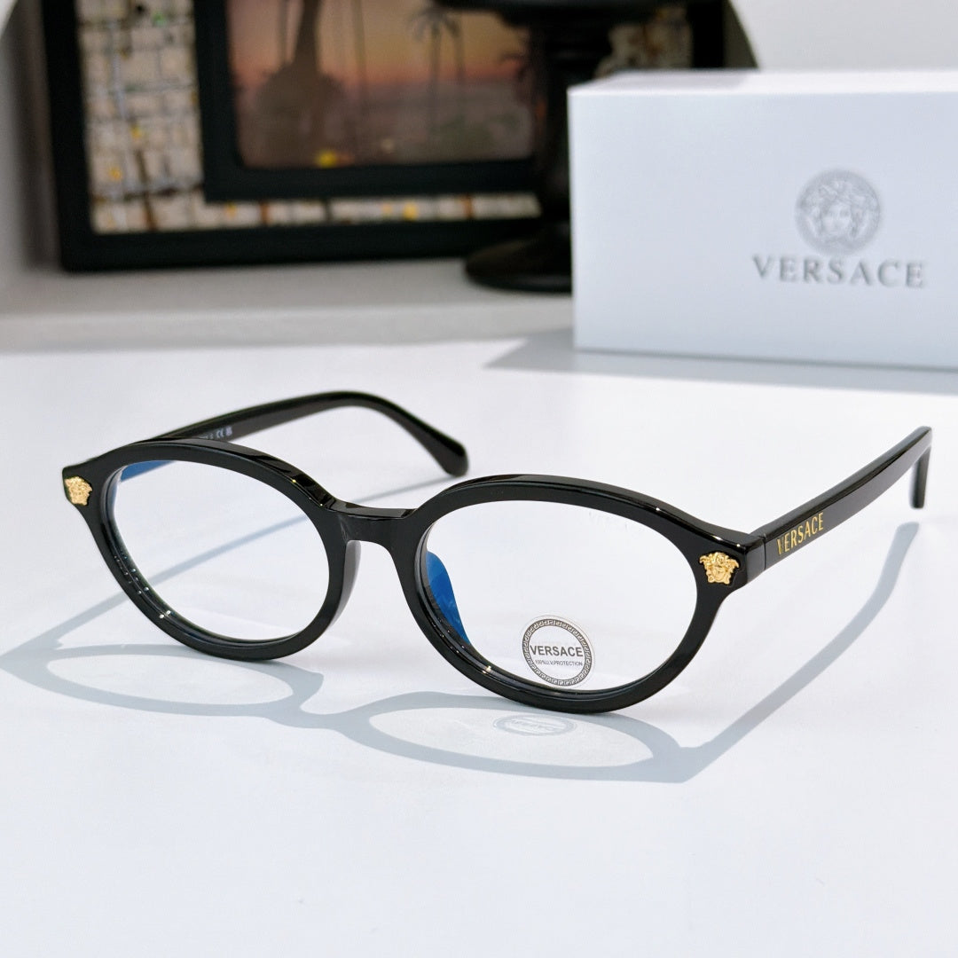 Round eyeglasses with black frames and blue tinted lenses