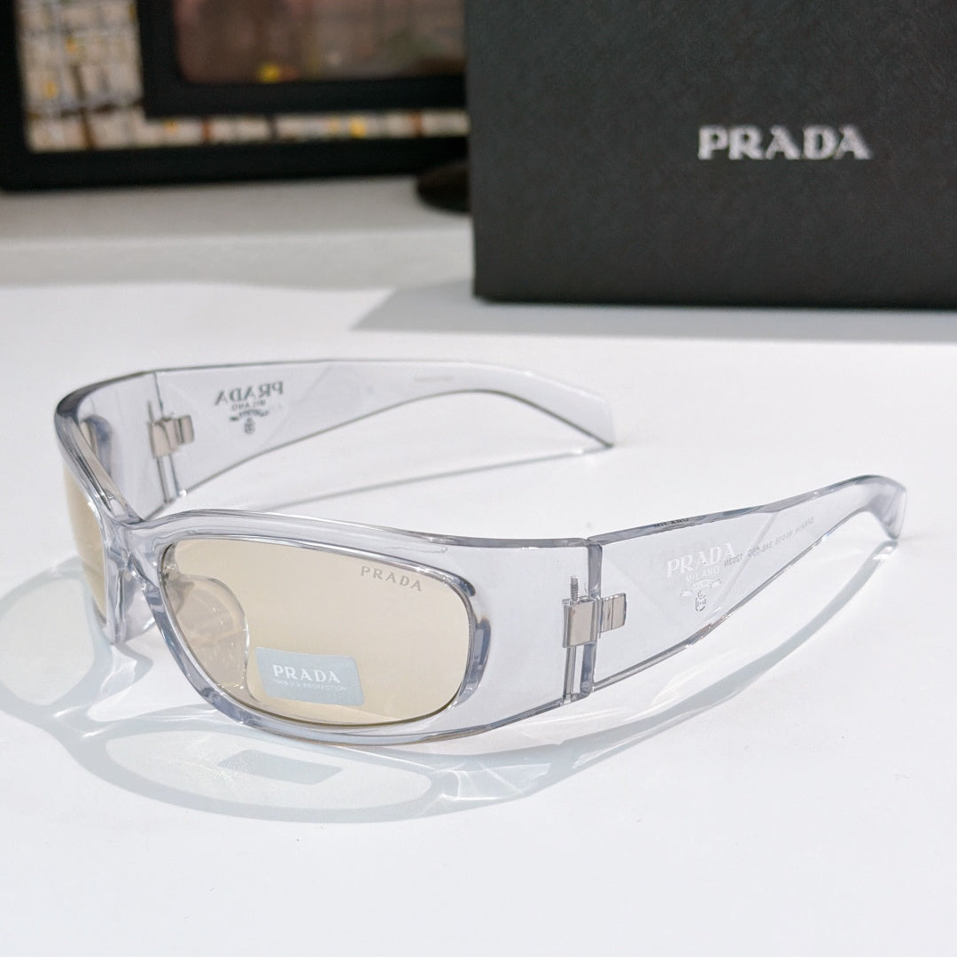 Prada clear frame glasses with beige lenses and metal logo arms