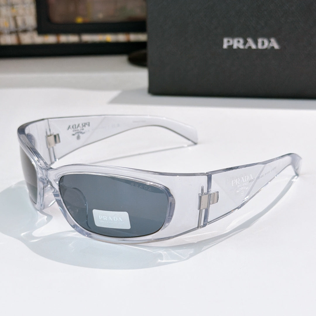 Prada clear frame glasses with dark gray lenses and metal logo hardware