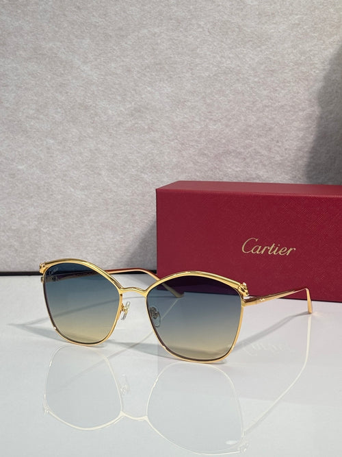 Cartier sunglasses with gold round frames and blue-tinted lenses