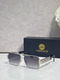 Versace sunglasses with silver frame and dark lenses, geometric temple detail