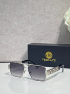 Versace sunglasses with silver frame and dark lenses, geometric temple detail