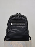 YSL black nylon backpack with front zip pockets and drawstring pull tabs