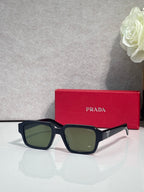 Dark green-tinted square sunglasses with black frame and white side arms