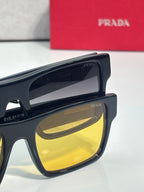 Prada sunglasses close-up of dark frame and yellow mirror lenses
