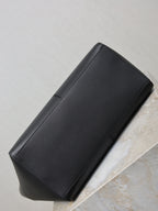 YSL black tote bag, narrow rectangular side profile with stitched edging