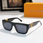 Sunglasses with black frames and dark blue lenses, gold LV logo on temples.