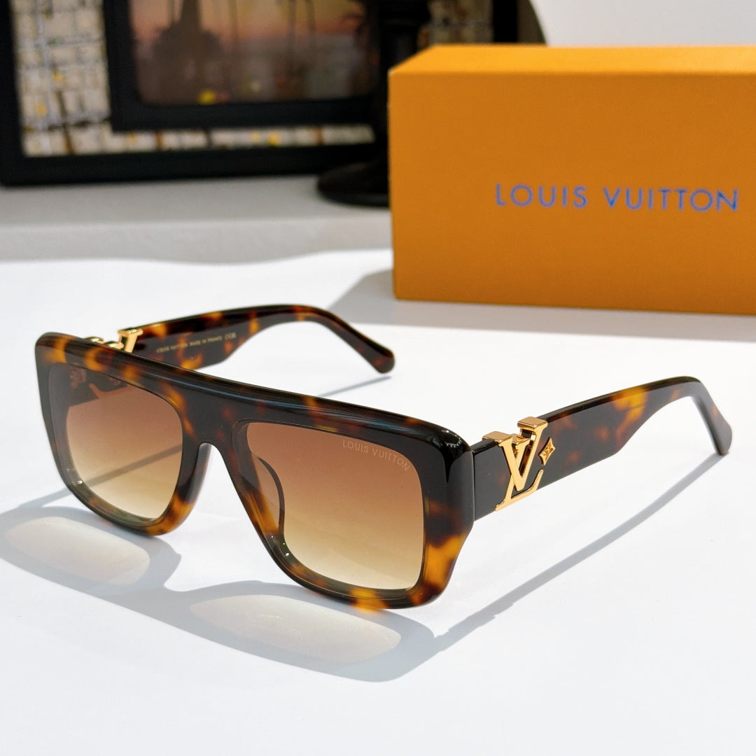 Louis Vuitton glasses with tortoiseshell frames and amber tinted lenses