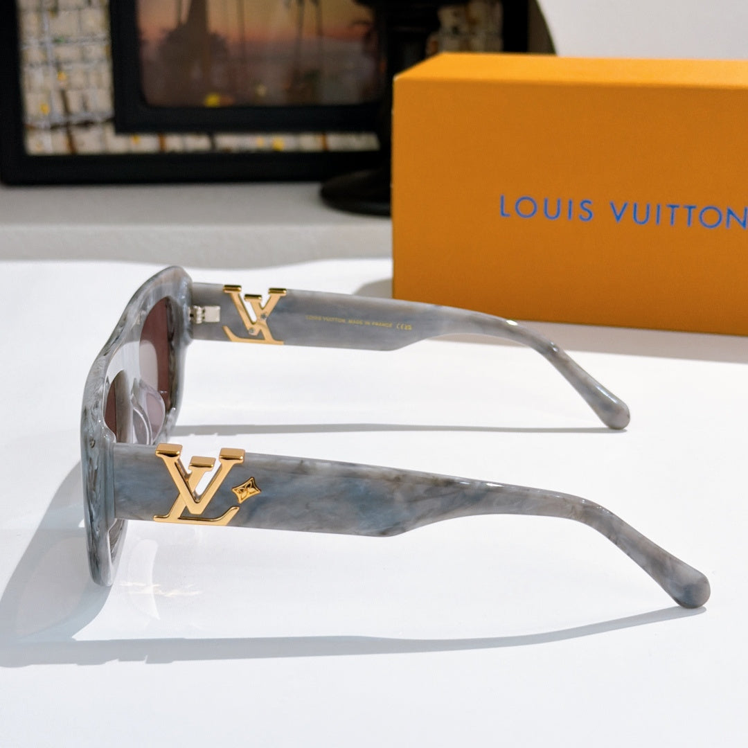 Louis Vuitton glasses with translucent gray frames and tinted lenses, side view