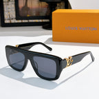 Louis Vuitton glasses with black frames and blue tinted lenses