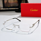 Cartier eyeglasses with clear lenses and gold metal octagonal frame