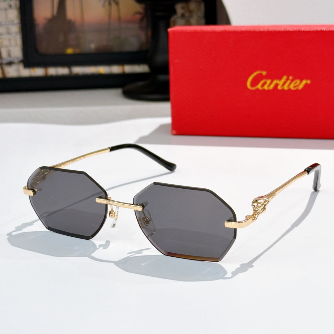 Cartier sunglasses with octagonal dark lenses and gold metal frame