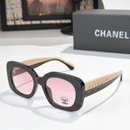 Chanel sunglasses with black frame and pink tinted lenses, beige-tan arms with dot trim