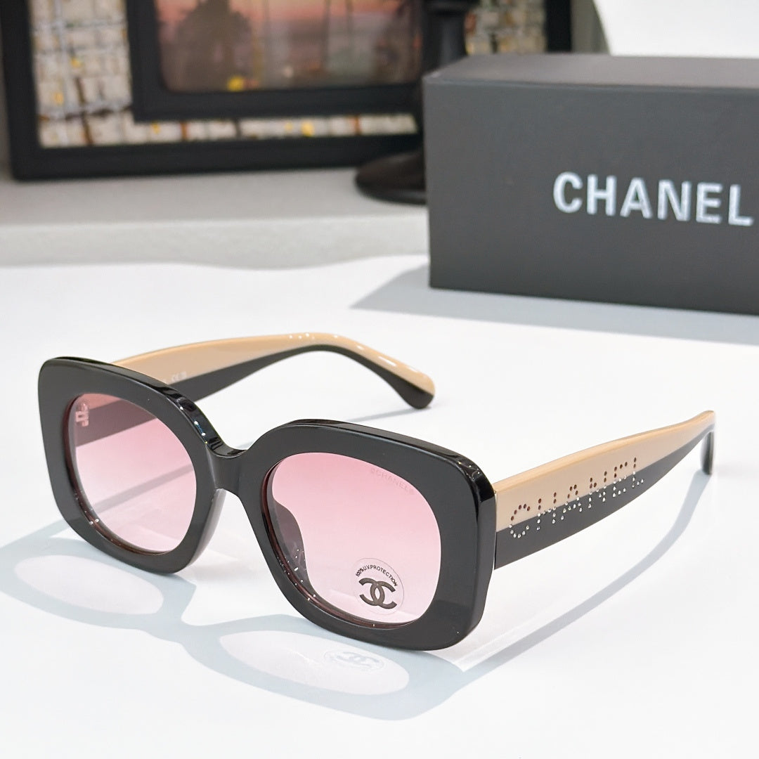 Chanel sunglasses with black frame and pink tinted lenses, beige-tan arms with dot trim