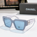Square light blue sunglasses with blue tinted lenses and silver side logo