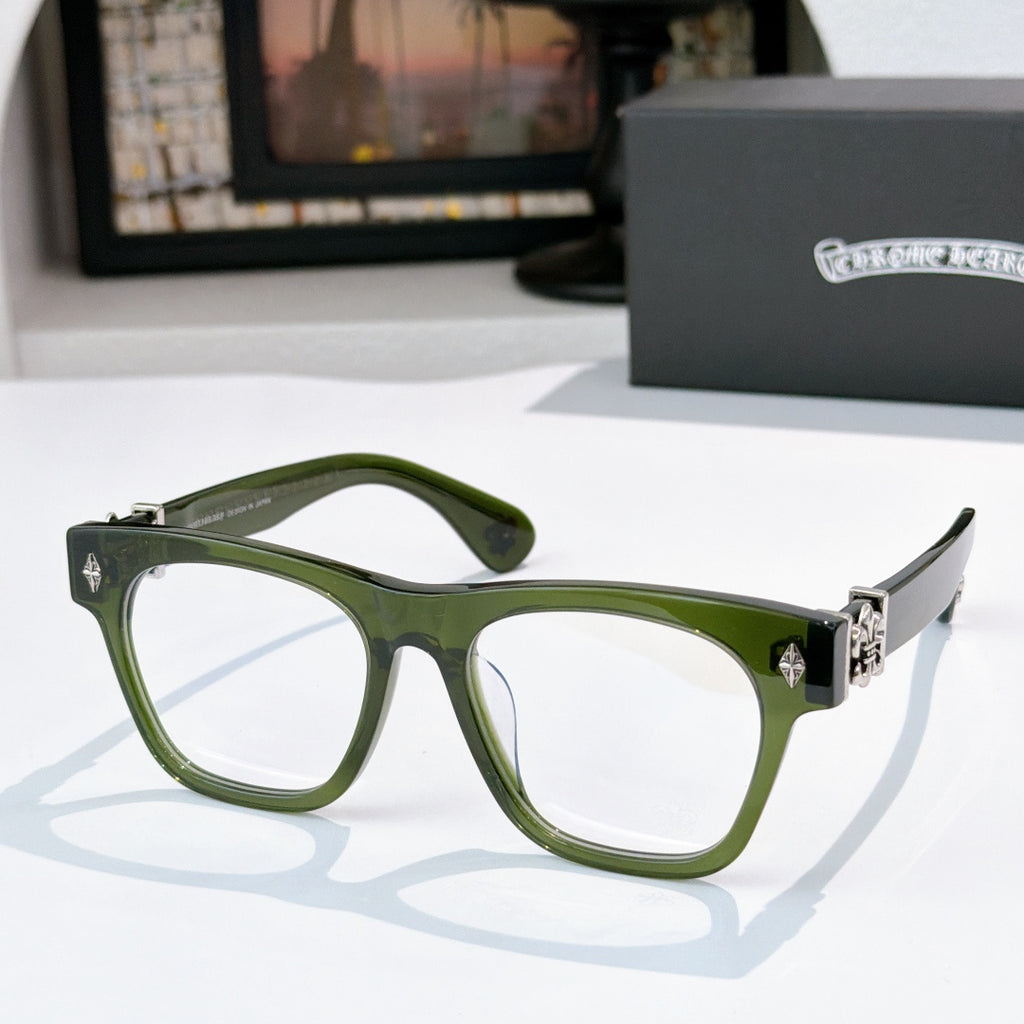 Olive green eyeglasses with gold-tone hinges and curved temple arms.