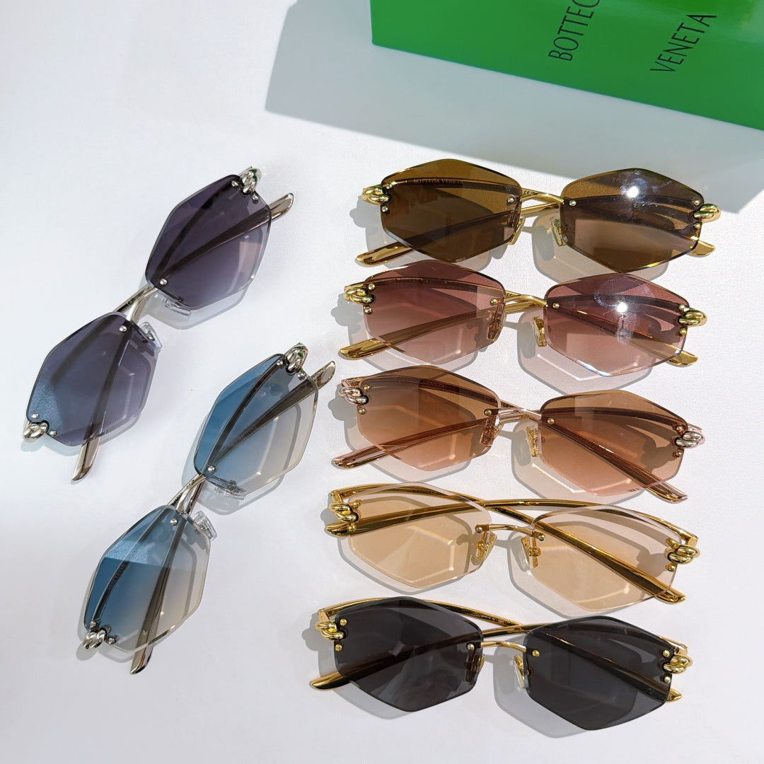Assorted sunglasses in dark, blue, and brown tones with metal frames