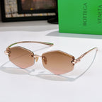 Rose-gold metal sunglasses with light tan lenses and gold temples