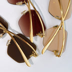 Bottega Veneta sunglasses detail, gold-tone temples and assorted lens tints.