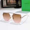 Bottega Veneta sunglasses, rose-brown gradient lenses, gold-tone metal frame.