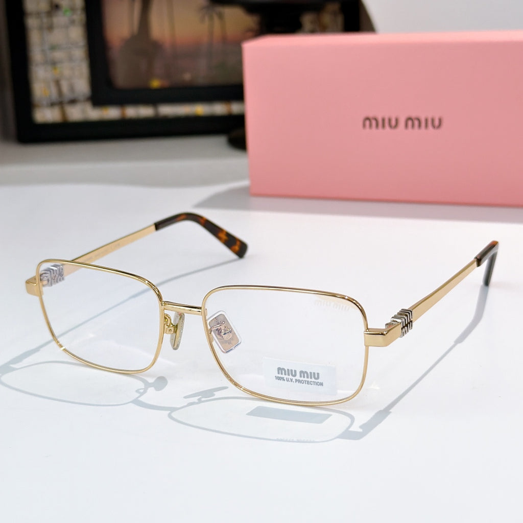 MiuMiu glasses with gold-tone frame and clear lenses, tortoise temple tips