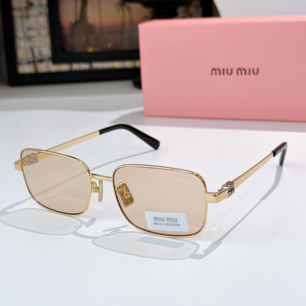 MiuMiu glasses with gold-tone frame and light lenses, black temple tips