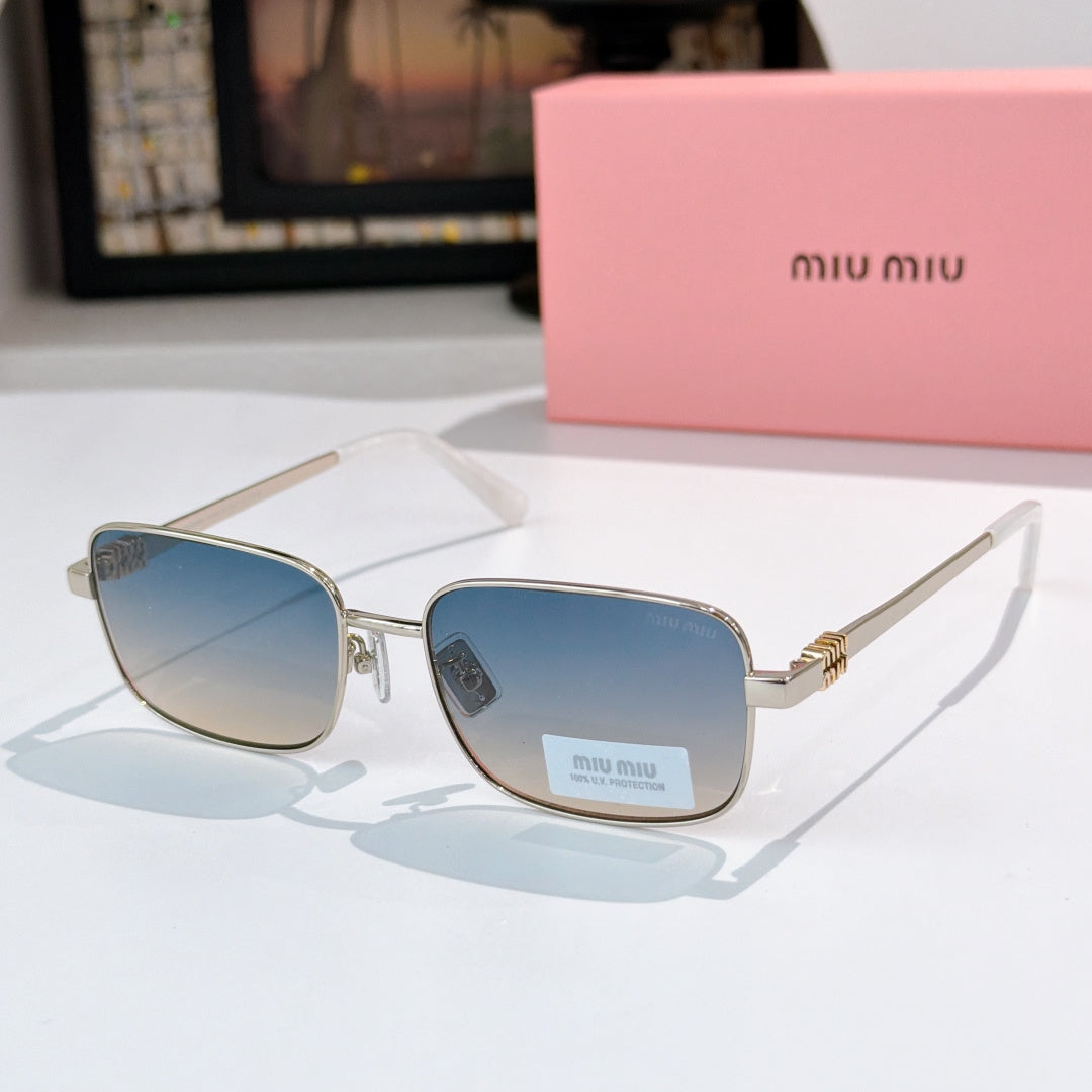 MiuMiu glasses with gold-tone frame and blue gradient lenses