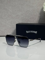 Sunglasses with gold-tone frame and dark blue tinted lenses, rectangular square shape