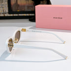 White cat-eye sunglasses with gold-tone temple logo and tinted lenses