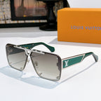 Silver-tone sunglasses with green temple accents and light gray tinted lenses