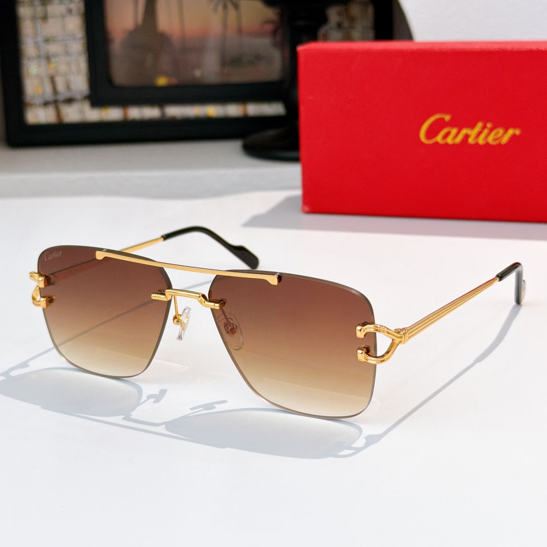 Cartier sunglasses with gold-tone frame and brown gradient lenses