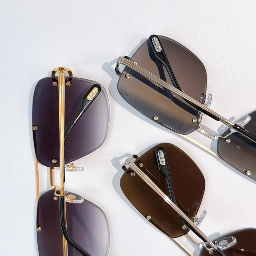 Cartier sunglasses set with purple, brown, and dark gradient lenses