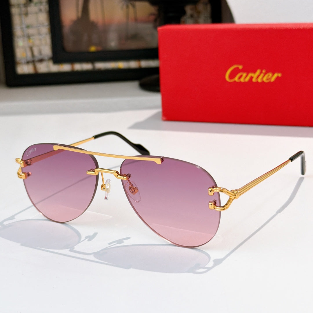 Aviator sunglasses with gold metal frame and purple-pink tinted lenses