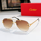 Aviator sunglasses with gold metal frame and light brown tinted lenses