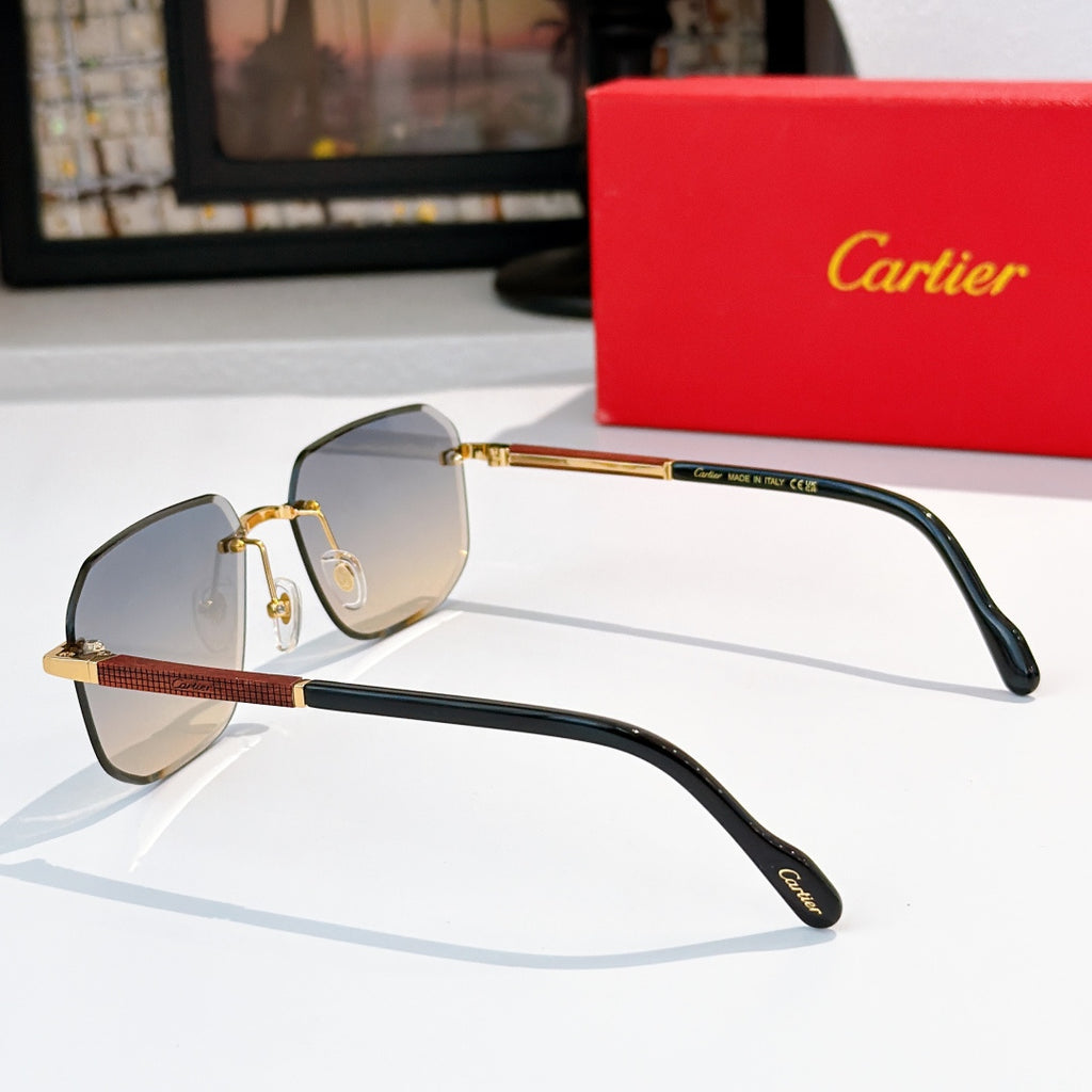Cartier glasses with dark frame and blue lenses, gold-tone arms and bridge detail