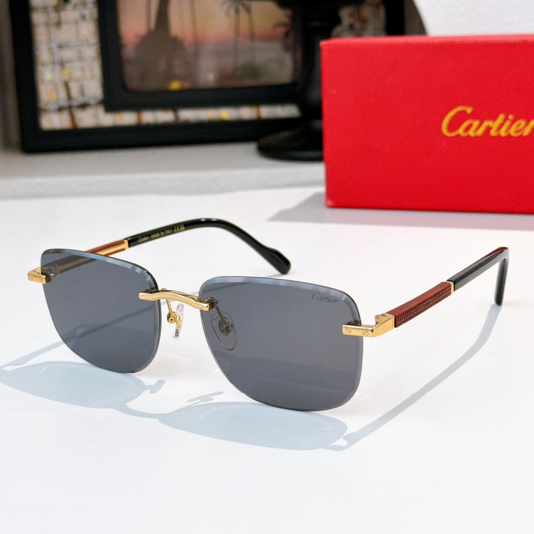 Cartier glasses with dark gray lenses, gold metal frame, tortoise temple accents