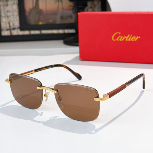 Cartier glasses with brown tinted lenses, gold metal frame, tortoise temple accents
